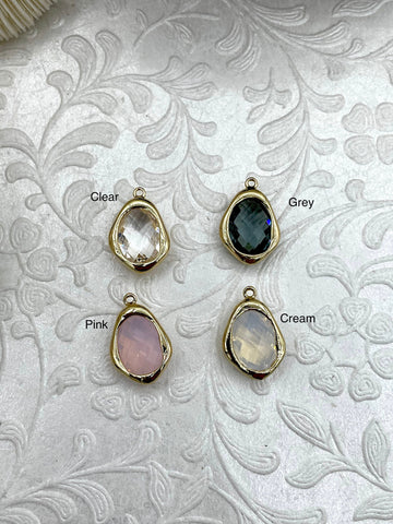 Gold Trimmed Crystal Drop Pendants, Gold Trimmed Charms. Gold plated bezel, 4 styles, clear, grey, cream, and pink. Fast Ship