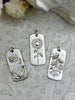 Image of Brass Cartouche Dog Tag Flower Charm, Flower Pendant, Dainty Flower Charm, Daisy Flower, Sun Flower or Poppy Flower 2 finishes 30mmx14mm
