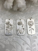 Image of Brass Cartouche Dog Tag Flower Charm, Flower Pendant, Dainty Flower Charm, Daisy Flower, Sun Flower or Poppy Flower 3 finishes 30mmx14mm