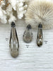 Image of Smokey Crystal Pendants and charms with Clear and Gunmetal Cubic Zirconia. 4 Styles of Charms and Pendants, Smokey Crystal. Fast Shipping