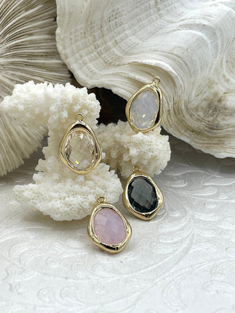 Gold Trimmed Crystal Drop Pendants, Gold Trimmed Charms. Gold plated bezel, 4 styles, clear, grey, cream, and pink. Fast Ship